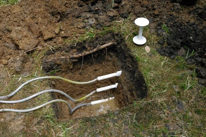 TMS Buriable split sensor and cables in an open soil pit