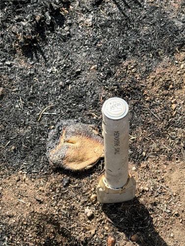 TMS datalogger standing in the burnt ground after the fire, still working